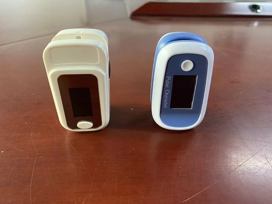Small OLED Fingertip Pulse Oximeter Manual Adjustable For SpO2 Pulse Monitoring